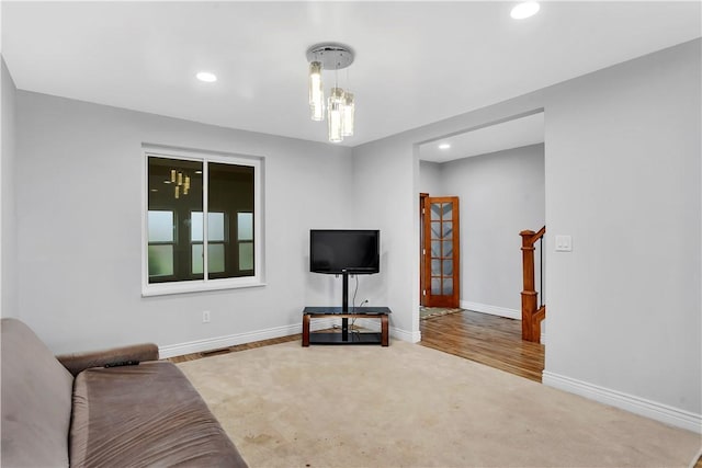 living area featuring baseboards, carpet, recessed lighting, and visible vents