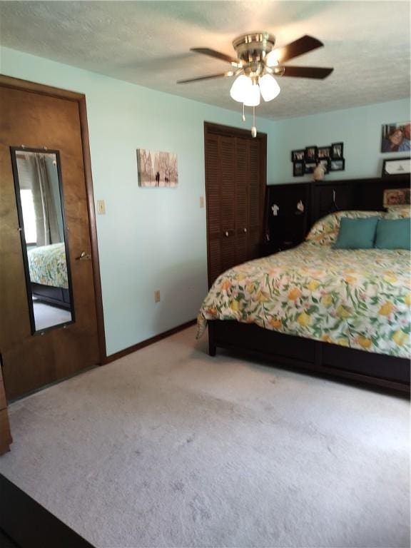 100 Forest Dr, Natrona Hts/Harrison Twp, PA 15065 - bedroom featuring carpet flooring, baseboards, ceiling fan, and a closet