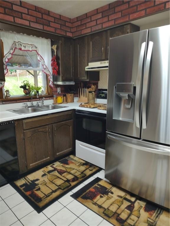 kitchen featuring stainless steel fridge with ice dispenser, white range with electric cooktop, a sink, range hood, and light countertops