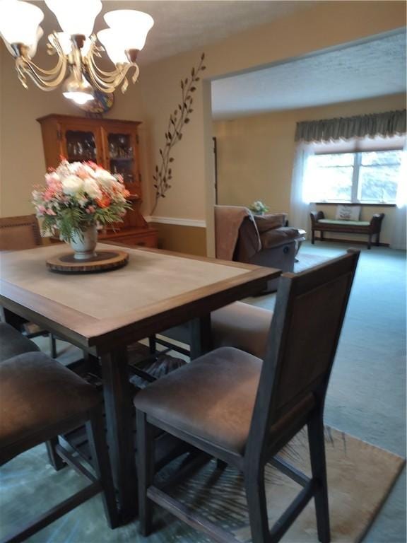 100 Forest Dr, Natrona Hts/Harrison Twp, PA 15065 - dining space with a chandelier and carpet floors