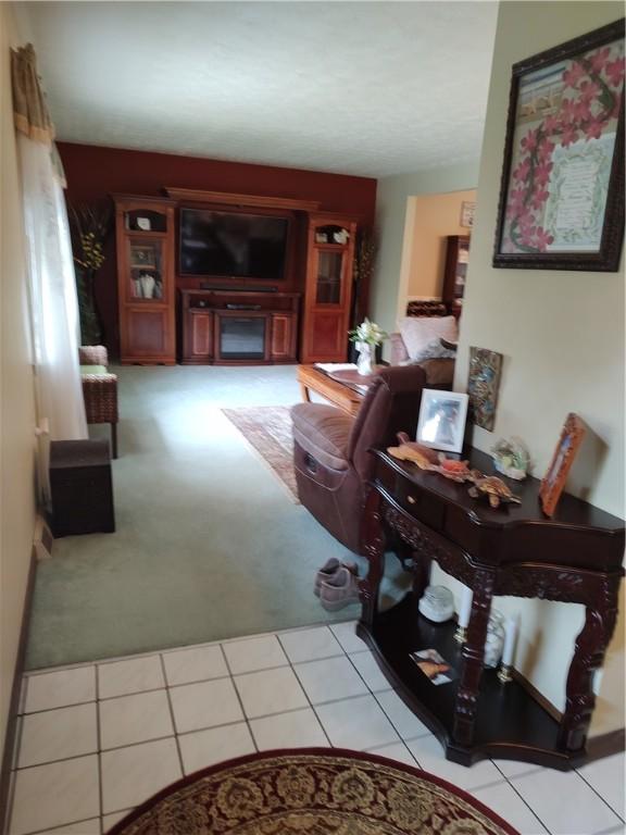 100 Forest Dr, Natrona Hts/Harrison Twp, PA 15065 - living area featuring light carpet and light tile patterned floors