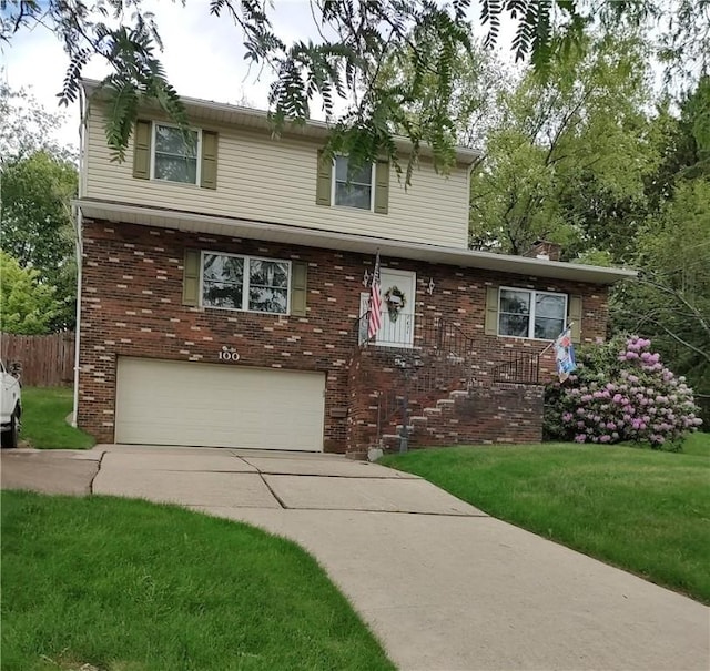 100 Forest Dr, Natrona Hts/Harrison Twp, PA 15065 - traditional-style house with a garage, concrete driveway, and brick siding