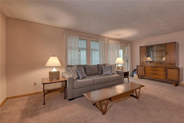 1712 Educational Dr, White Oak, PA 15131 - living room featuring light carpet and baseboards