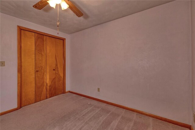 1712 Educational Dr, White Oak, PA 15131 - unfurnished bedroom with carpet, baseboards, a closet, and ceiling fan