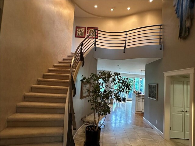 337 Saratoga Dr, South Union Twp, PA 15401 - stairs featuring a high ceiling and recessed lighting