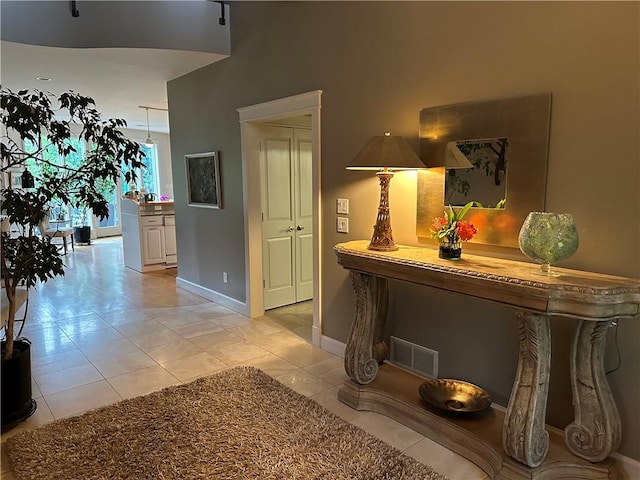 337 Saratoga Dr, South Union Twp, PA 15401 - hallway featuring light tile patterned floors and baseboards