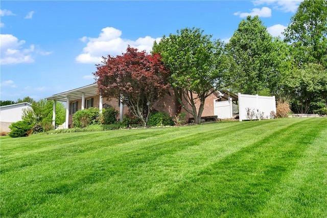 view of yard with fence