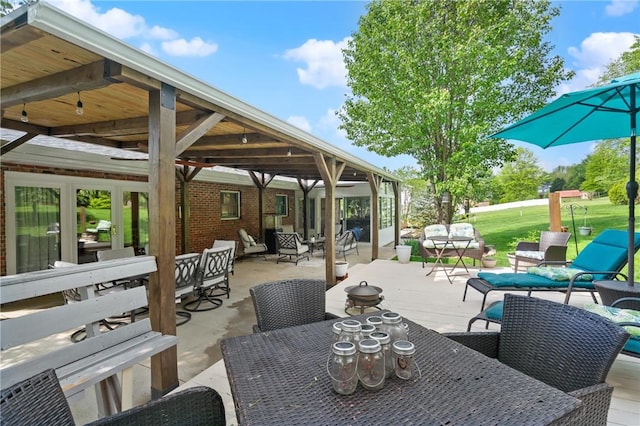 view of patio featuring a gazebo, outdoor dining area, and outdoor lounge area