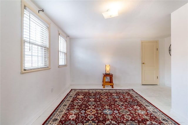 empty room with baseboards