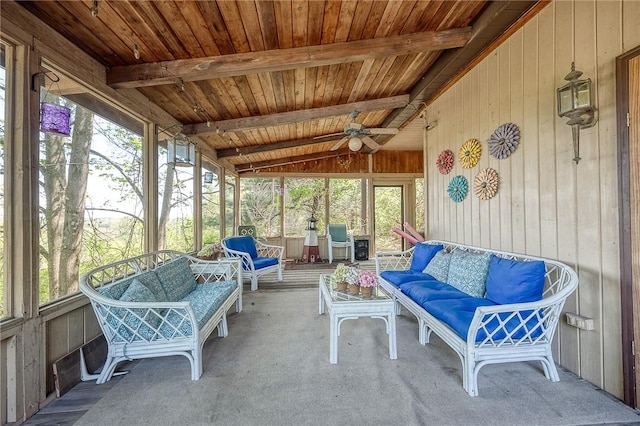 sunroom / solarium with ceiling fan, outdoor lounge area, and beam ceiling