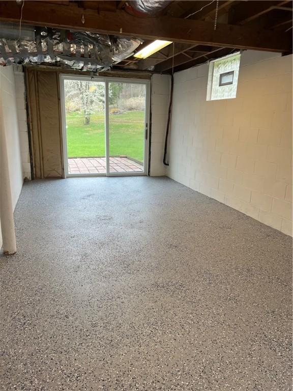 garage featuring concrete block wall