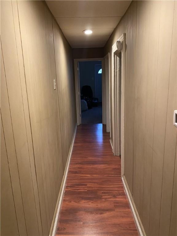 hall featuring dark wood finished floors