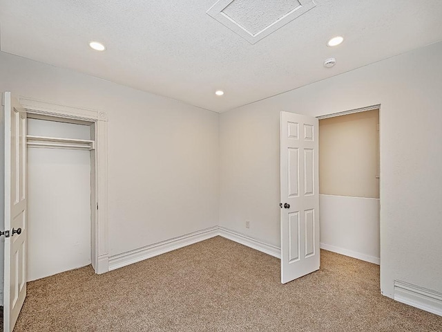 unfurnished bedroom with carpet flooring and recessed lighting