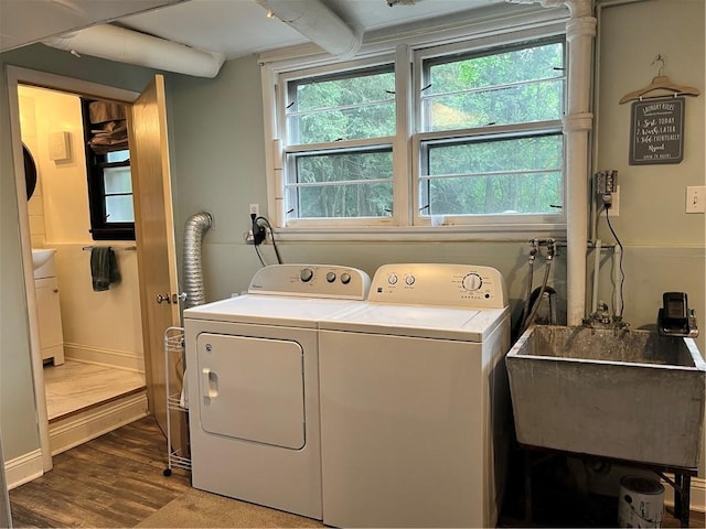 440 School St, Indiana Boro Ind, PA 15701 - clothes washing area featuring separate washer and dryer, laundry area, a sink, and wood finished floors