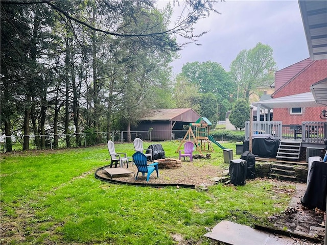 440 School St, Indiana Boro Ind, PA 15701 - view of yard with a playground, an outdoor fire pit, fence, and a deck