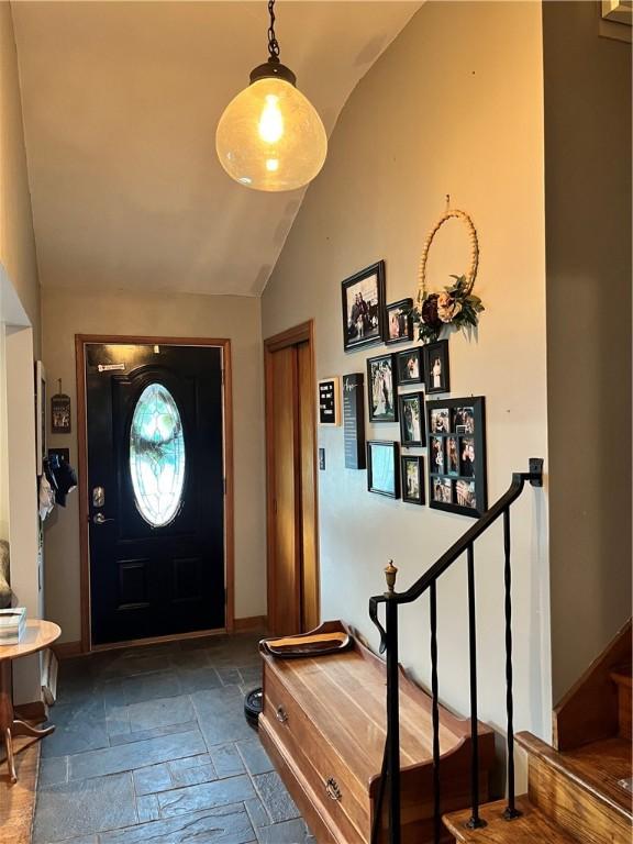440 School St, Indiana Boro Ind, PA 15701 - entryway featuring stairs, baseboards, vaulted ceiling, and stone tile flooring
