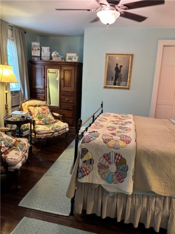 bedroom featuring ceiling fan and hardwood / wood-style floors