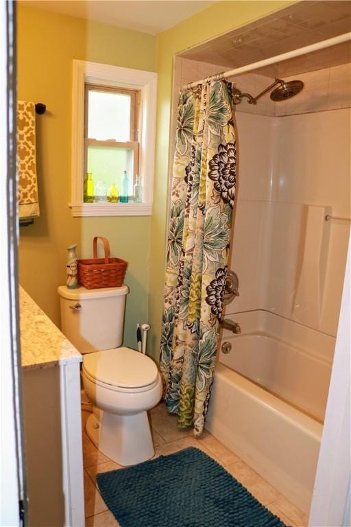 bathroom featuring toilet, tile patterned floors, shower / bathtub combination with curtain, and vanity