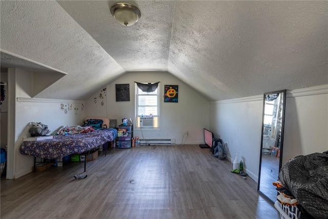 bedroom featuring a textured ceiling, vaulted ceiling, wood finished floors, baseboards, and a baseboard radiator