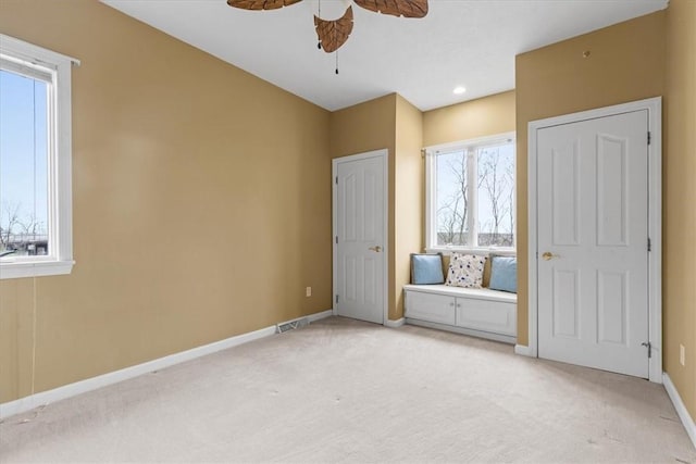 5076 Brownsville Rd, Whitehall, PA 15236 - unfurnished bedroom with baseboards, a ceiling fan, visible vents, and light carpet