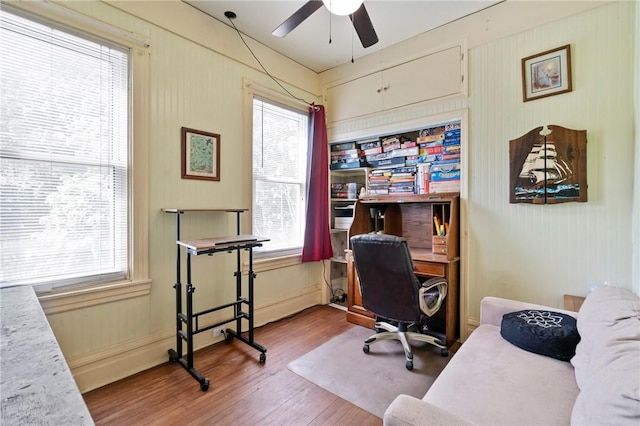 704 E 10th Ave, Munhall, PA 15120 - home office featuring a ceiling fan and wood finished floors