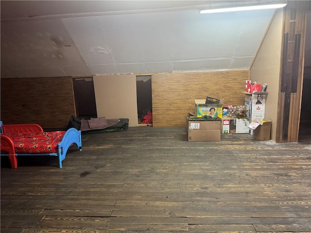 additional living space featuring wood-type flooring