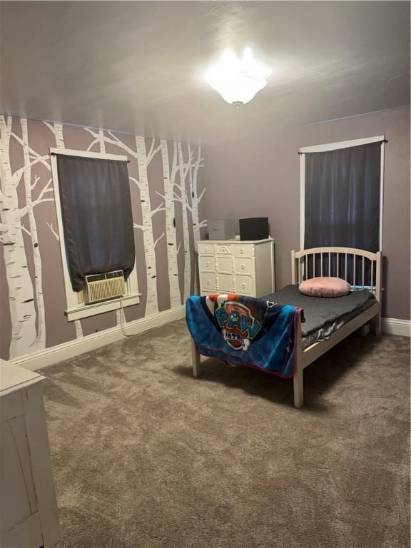 bedroom featuring carpet floors, baseboards, and cooling unit