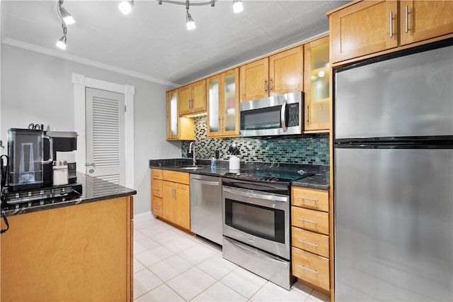 552 N Neville St Unit 26, Oakland, PA 15213 - kitchen featuring appliances with stainless steel finishes, ornamental molding, track lighting, light tile patterned floors, and tasteful backsplash