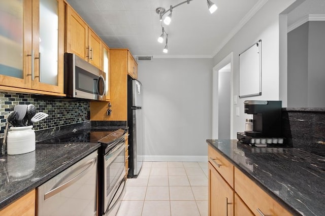 552 N Neville St Unit 26, Oakland, PA 15213 - kitchen featuring appliances with stainless steel finishes, tasteful backsplash, dark stone counters, crown molding, and light tile patterned floors