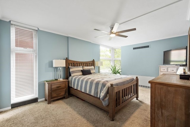 552 N Neville St Unit 26, Oakland, PA 15213 - bedroom with light colored carpet, baseboards, crown molding, and a ceiling fan