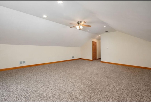 bonus room with visible vents, light carpet, baseboards, recessed lighting, and vaulted ceiling