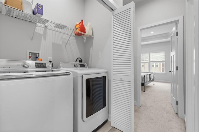 washroom with light carpet, laundry area, separate washer and dryer, and recessed lighting