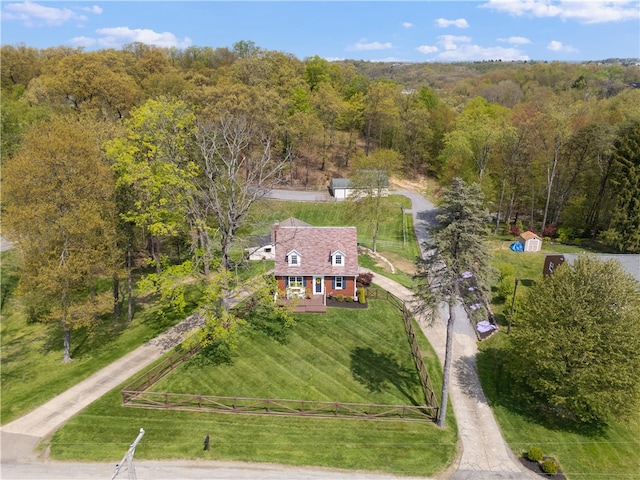 aerial view with a wooded view