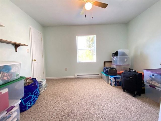 interior space featuring a baseboard radiator and ceiling fan