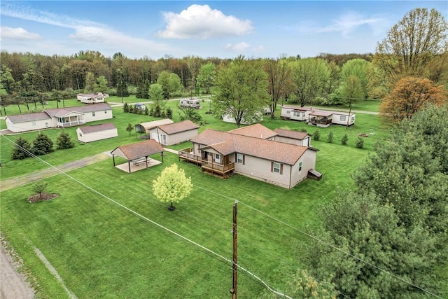 bird's eye view featuring a view of trees