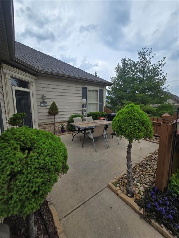 view of patio featuring outdoor dining area