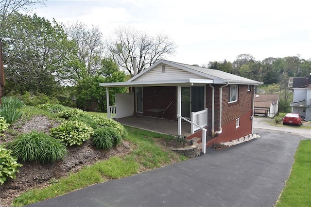 851REAR Florence Ave, Rear, East Mckeesport, PA 15035 - bungalow featuring brick siding and a porch