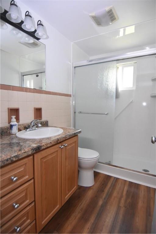 851REAR Florence Ave, Rear, East Mckeesport, PA 15035 - bathroom featuring vanity, visible vents, wood finished floors, and a shower stall