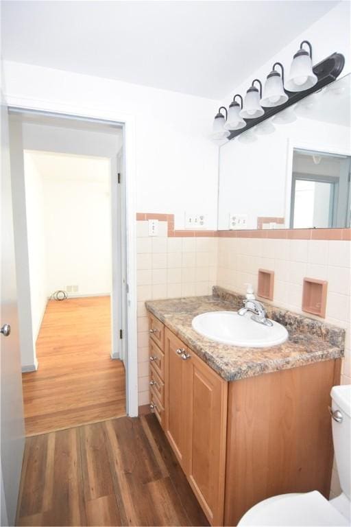 851REAR Florence Ave, Rear, East Mckeesport, PA 15035 - bathroom with vanity, toilet, tile walls, and wood finished floors