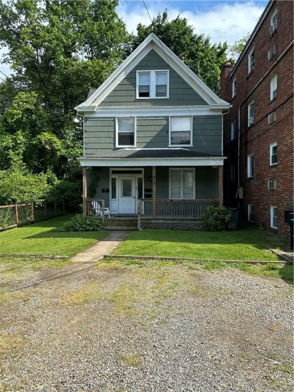 617 Center Ave, West View, PA 15229 - view of front of property with a front yard, a porch, and fence