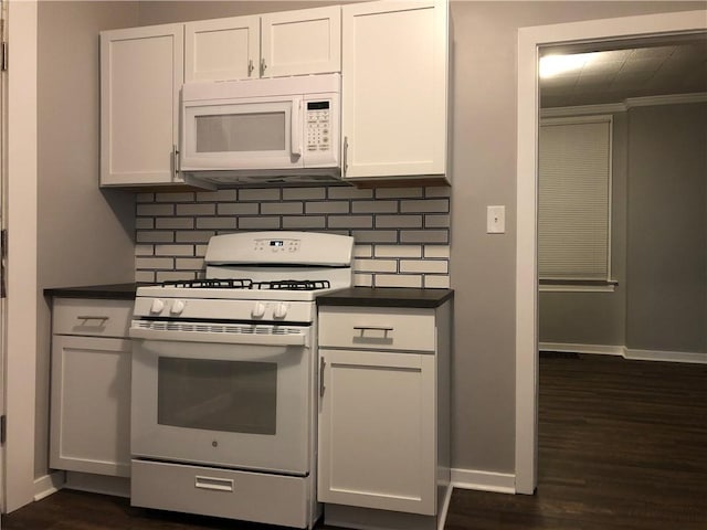 617 Center Ave, West View, PA 15229 - kitchen featuring baseboards, white appliances, tasteful backsplash, and dark countertops