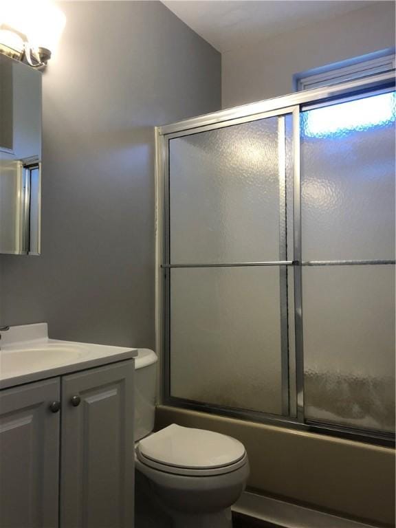 617 Center Ave, West View, PA 15229 - bathroom with toilet, enclosed tub / shower combo, and vanity
