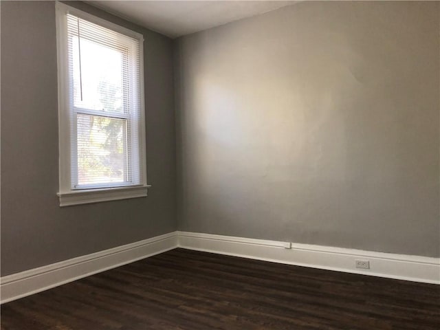 617 Center Ave, West View, PA 15229 - spare room featuring baseboards, a healthy amount of sunlight, and dark wood-style floors