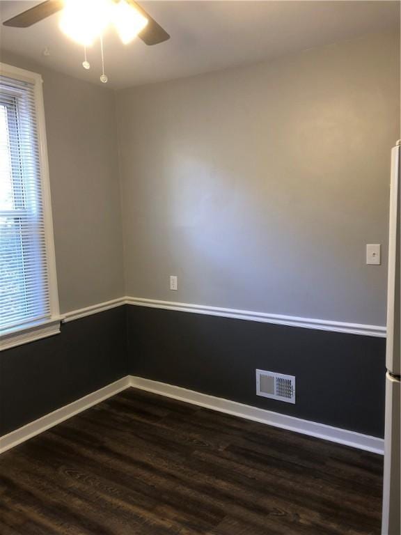 617 Center Ave, West View, PA 15229 - unfurnished room with baseboards, ceiling fan, dark wood finished floors, and visible vents