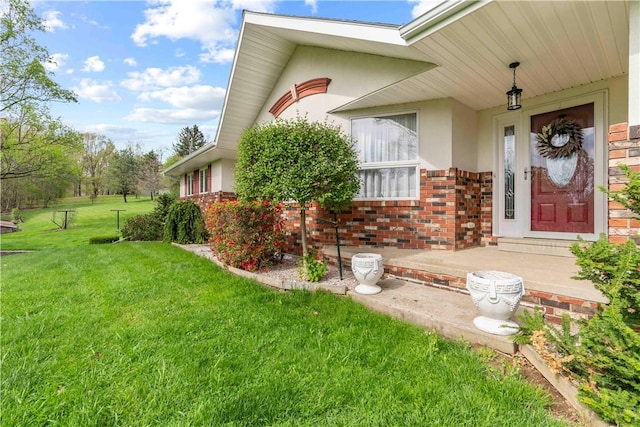 78 Cherryhill Rd, Indiana Boro Ind, PA 15701 - entrance to property with a lawn, stucco siding, and brick siding