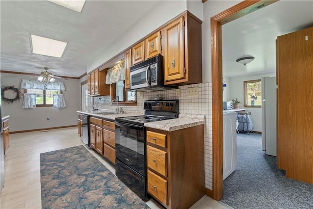 78 Cherryhill Rd, Indiana Boro Ind, PA 15701 - kitchen featuring a sink, black range with electric cooktop, freestanding refrigerator, stainless steel microwave, and dishwasher