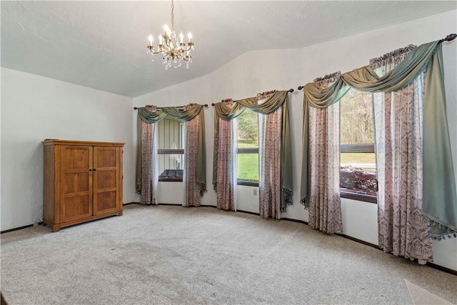 78 Cherryhill Rd, Indiana Boro Ind, PA 15701 - carpeted empty room featuring a chandelier, vaulted ceiling, and baseboards