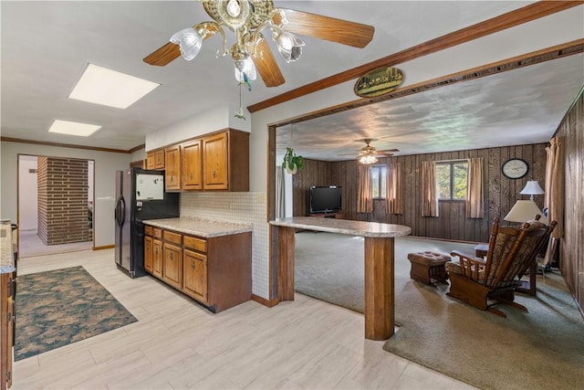 78 Cherryhill Rd, Indiana Boro Ind, PA 15701 - kitchen featuring freestanding refrigerator, brown cabinets, open floor plan, and ceiling fan