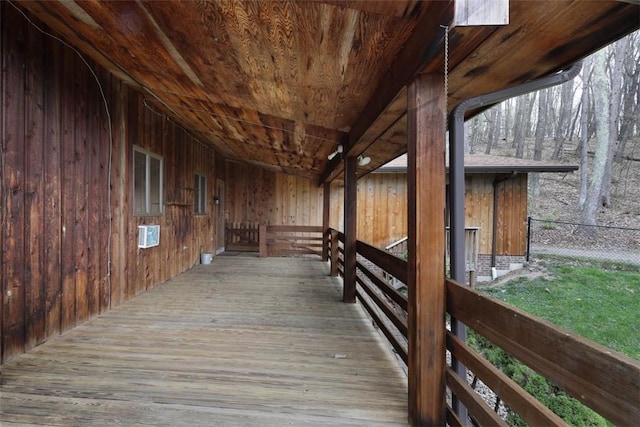 wooden deck featuring an exterior structure