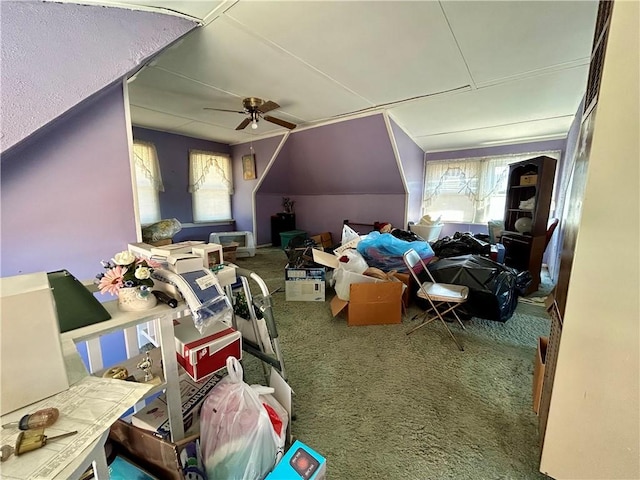 additional living space featuring ceiling fan, carpet flooring, and plenty of natural light